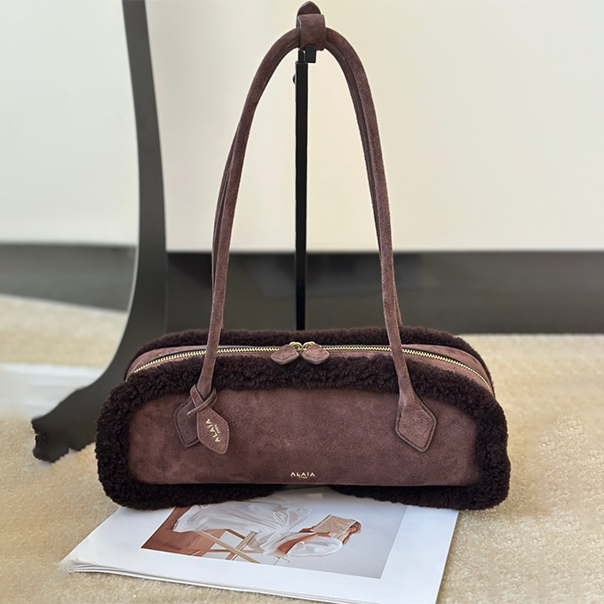 alaïa le teckel shearling long barrel shoulder handbag